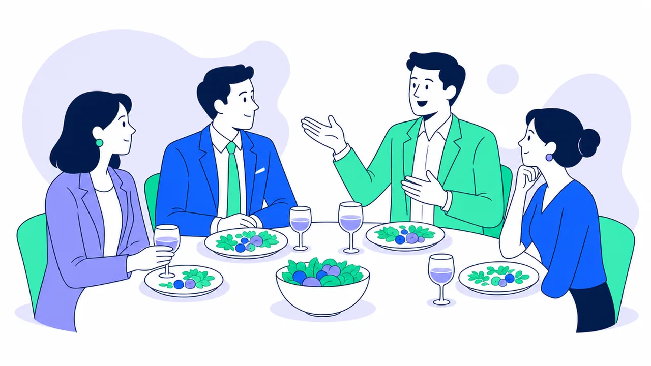 Four professionals in smart clothes at a restaurant table with plates and glasses; the host gestures while talking, in warm evening light