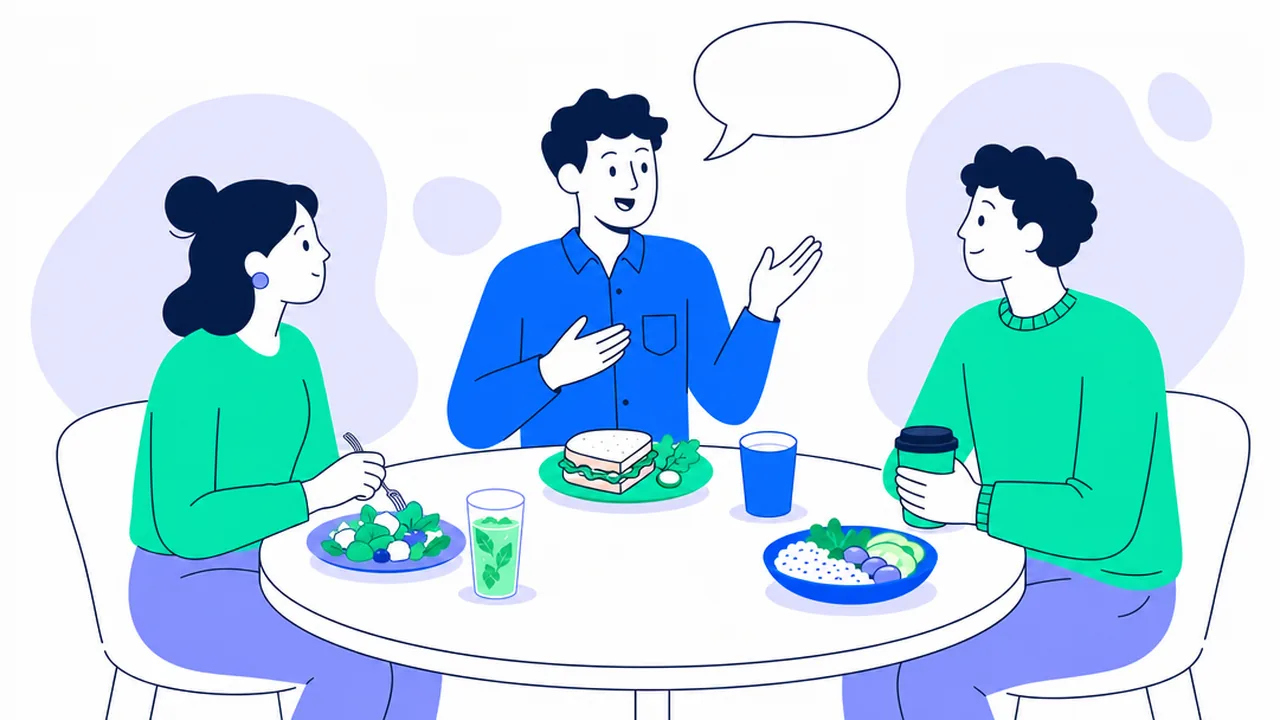 Three coworkers at a round café table with a salad, a sandwich and a rice bowl; the man in the middle is talking, with an empty speech bubble above him